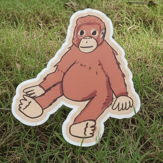Cartoon-style sticker of an orangutan on a plain background
